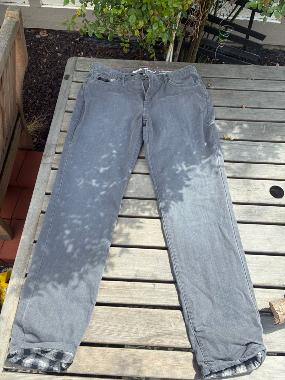 Eddie Bauer fleece lined jeans 
Women’s size 10Gray  Pants with Plaid Cuff